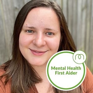 Alice Newton, a white woman with straight brown hair, is smiling. The image includes a Mental Health First Aider badge.