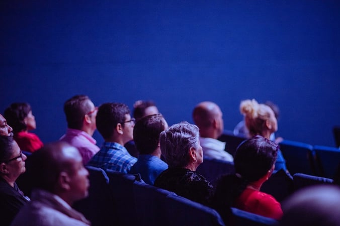 An audience focused on a live event