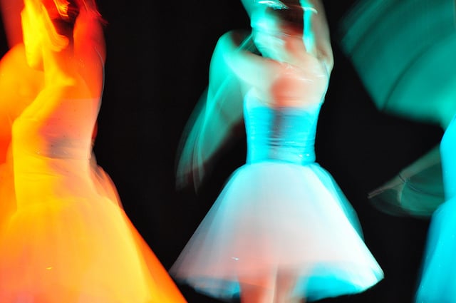 A blurred image of ballet dancers onstage