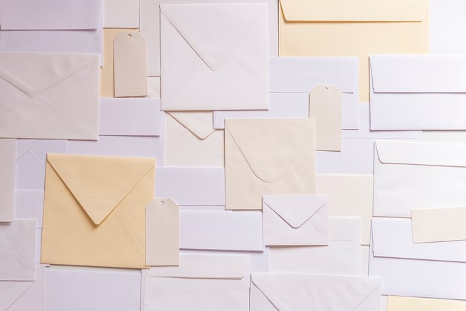 A collection of white and beige envelopes